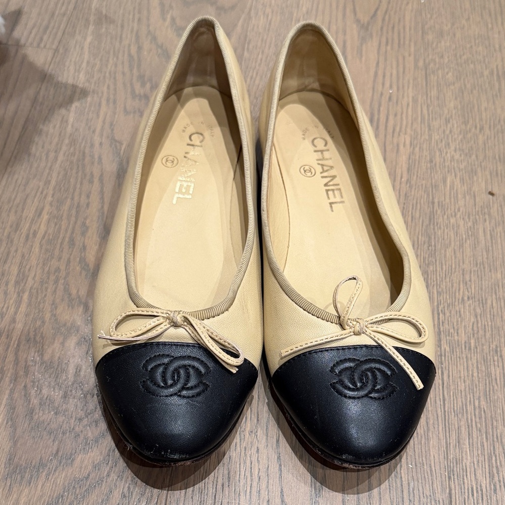 CHANEL Beige and Black Two-Tone Cap-Toe Ballet Flats